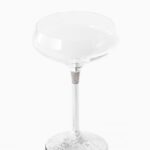 Cristal clear champagne glass with silver stem and base