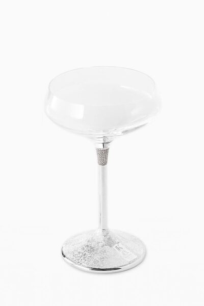 Cristal clear champagne glass with silver stem and base