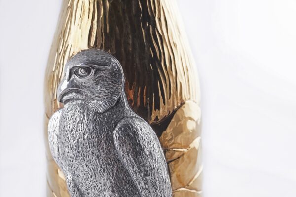 Detail of the champagne bottle cover Falcon